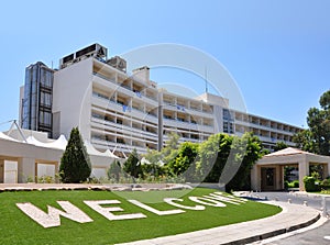 Hotel entrance with green lawn