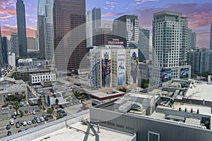 The Hotel Figueroa painted with a Transformers movie wall mural with a car wash, skyscrapers, office buildings and hotels