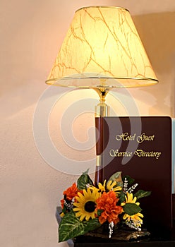 Hotel Guest Service Directory and Lamp photo