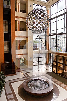 Hotel hall interior with fountain