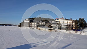 Hotel Lappland on Umeaalven river in Lycksele  in winter in Sweden photo