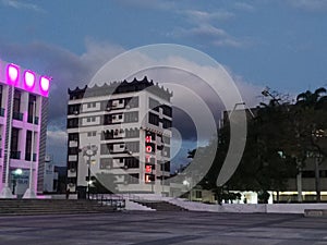 Hotel with lights at dusk photo