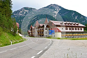 Hotel next to the road towards Toblach in SÃÂ¼dtirol region of Italy photo