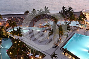 Hotel pools at sunset photo