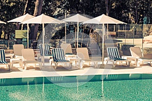 Hotel Poolside Chairs with Sea view