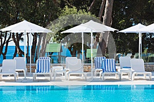 Hotel Poolside Chairs with Sea view