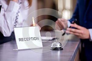 Hotel reception bell at the counter