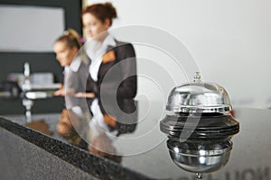 Hotel reception with bell photo