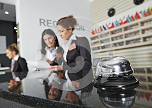 Hotel reception with bell photo