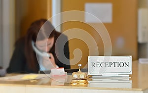 Hotel reception desk with bell