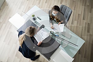 Hotel Reception Desk Protected By Medical Mask