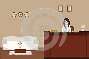 Hotel reception. Young woman receptionist stands at reception desk