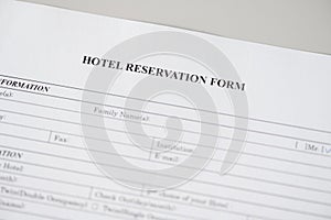 Hotel reservation form. Hotel service. Reception desk, registration. Close up. Selective focus.
