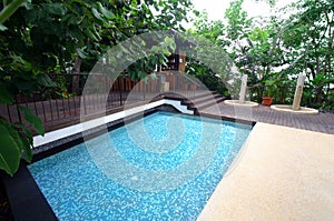 Hotel resort swimming pool & bar, tropical