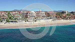 Hotel resorts on Cabo San Lucas coast, Mexico, sliding truck drone