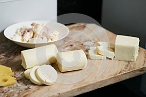Hotel restaurant table with various types of cheese. Buffet catering service
