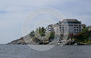 Hotel on rocky coast of Acapulco