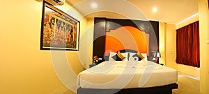 Hotel Room Decorated single double bedroom with bed nice colours. the colour scheme is designed for thailand