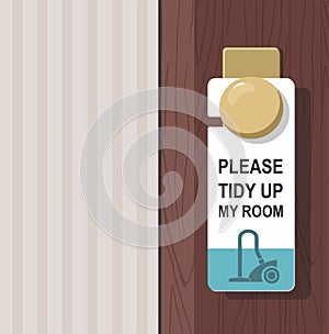 The hotel room with PLEASE MAKE UP ROOM sign on the door. Room cleaning