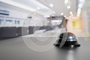 Hotel service bell on black table. Concept hotel