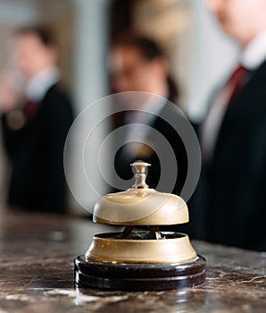 Hotel service bell Concept hotel, travel, room,Modern luxury hotel reception counter desk on background.