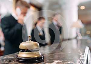 Hotel service bell Concept hotel, travel, room,Modern luxury hotel reception counter desk on background.