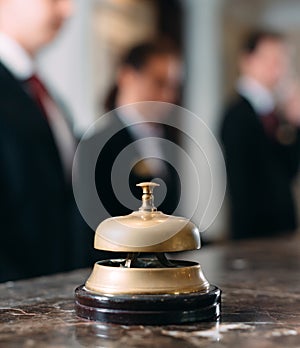 Hotel service bell Concept hotel, travel, room,Modern luxury hotel reception counter desk on background.