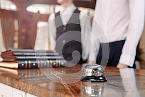 Hotel service bell Concept hotel, travel, room,Modern luxury hotel reception counter desk on background.