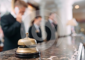 Hotel service bell Concept hotel, travel, room,Modern luxury hotel reception counter desk on background.