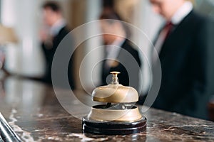 Hotel service bell Concept hotel, travel, room,Modern luxury hotel reception counter desk on background.