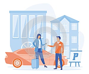 Hotel service concept. valet parking worker gets keys from clients car.