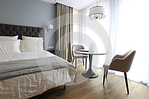 Hotel. Stylish interior of the hotel room with a large window