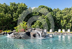 Hotel swimming pool with waterfall