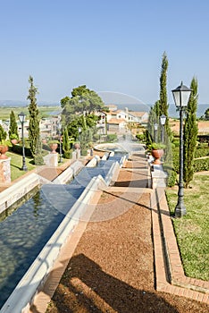 Hotel and Resort Serena at Lake Victoria near Kampala, Uganda, Africa. Water course and fountain. photo