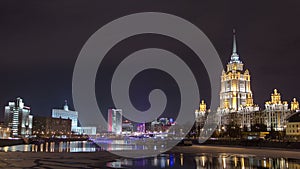 Hotel Ukraine winter night timelapse. Seen as reflected in the Moscow River.