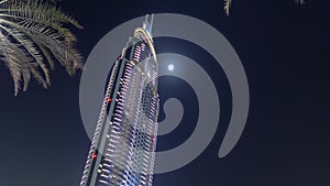 Hotel witin Moon in the downtown Dubai area overlooks the famous dancing fountains in Dubai, UAE. Timelapse