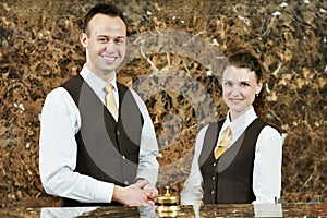 Hotel worker on reception photo