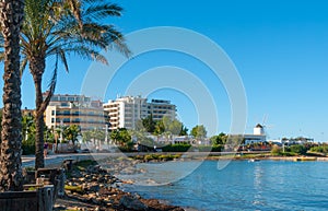 Hotels to stay at - sun on Ibiza waterfront. Warm sunny day along the beach in St Antoni de Portmany Balearic Islands, Spain