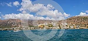 Hotels and tourist resorts, coast of Mirabello Bay, Gulf of Elounda, Crete, Greece