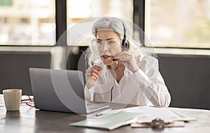 Hotline Operator Woman Wearing Headset Making Video Call In Office