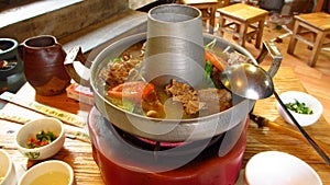 Hotpot with cured meat photo