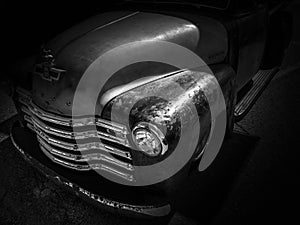 HOTROD CLASSIC CAR ON BLACK BACKGROUND