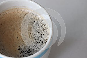 Hotâ€‹ coffeeâ€‹ inâ€‹ aâ€‹ ceramicâ€‹ cupâ€‹ with copy space.