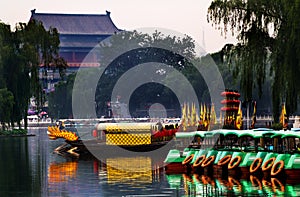 Houhai Lake Tourboats Drum Tower In Background Beijing, China