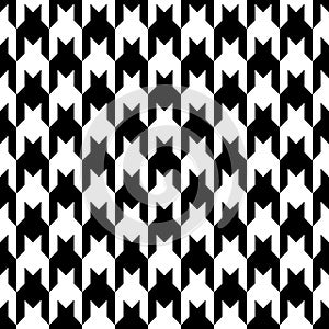 Houndstooth seamless pattern. Pied poule background. Repeating pieds tileable. Repeated abstract puppytooth. Tillable tweed. Foot photo