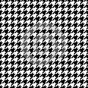 Houndstooth seamless pattern. Repeated houndtooth texture. Black hound tooth on white background. Repeating pepita plaid patern fo photo