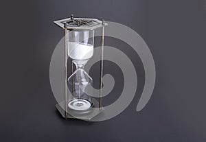 Hourglass as time passing concept for business deadline, urgency and running out of time