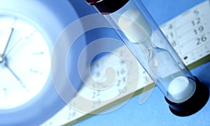 Hourglass, clock and calendar