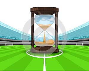 Hourglass countdown in the midfield of football stadium vector