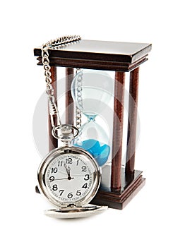 Hourglass and a pocket watch